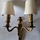 Pair of antique gilded iron wall lamps
