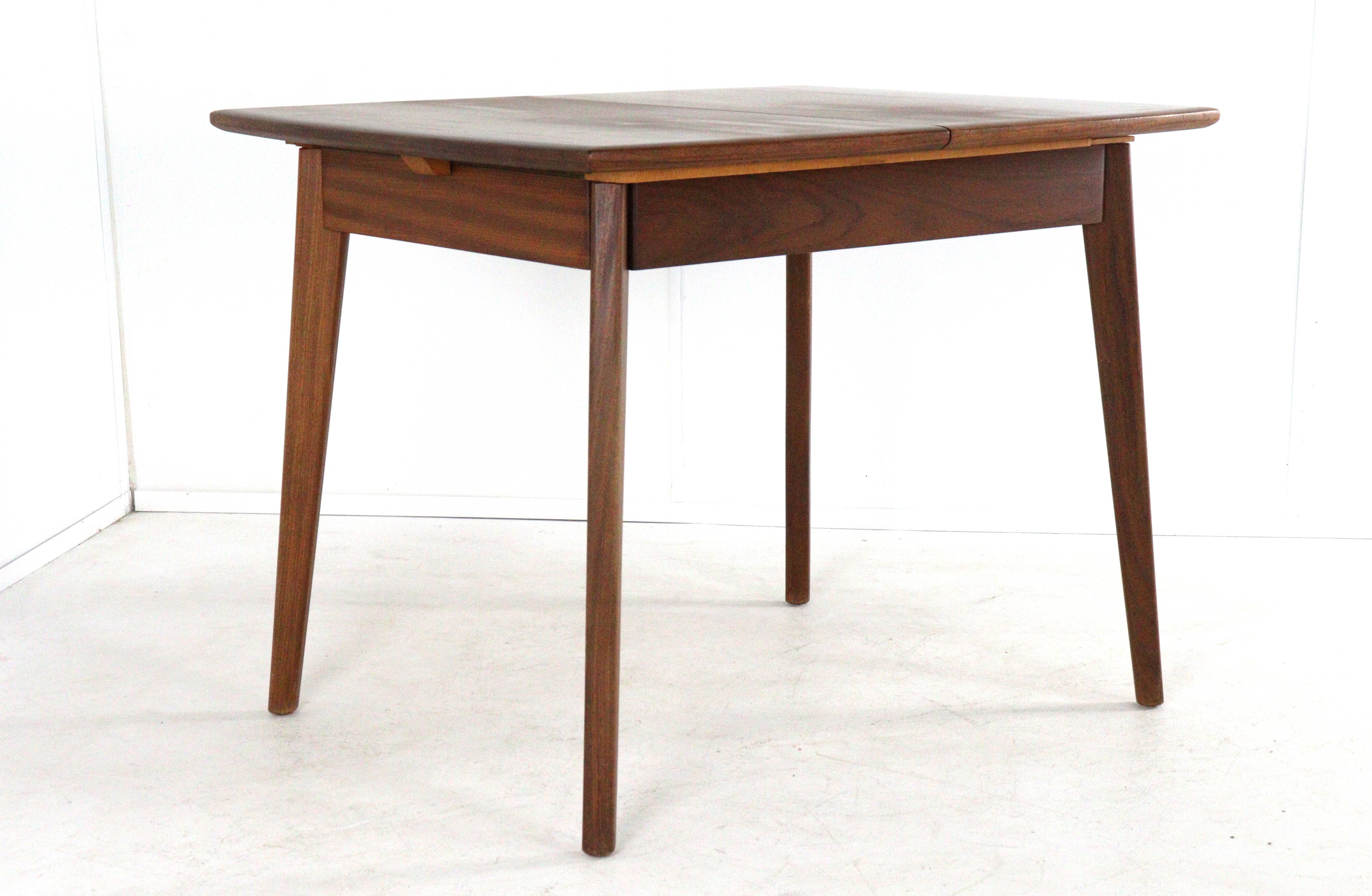 Table à manger rectangulaire extensible en teck - design néerlandais mid-century moderne