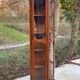 Quarter-round corner display cabinet in solid wood