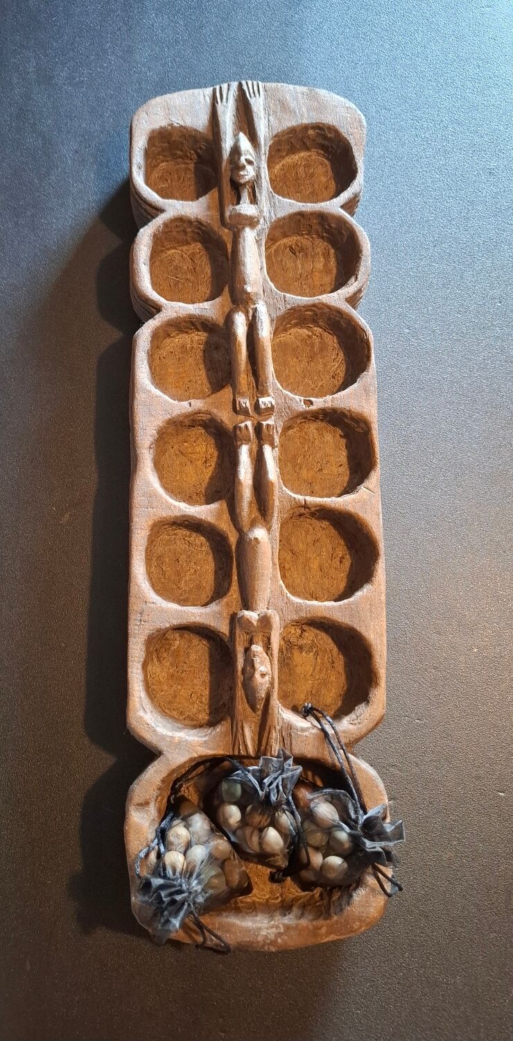 Genuine traditional Awalé made of carved solid wood.