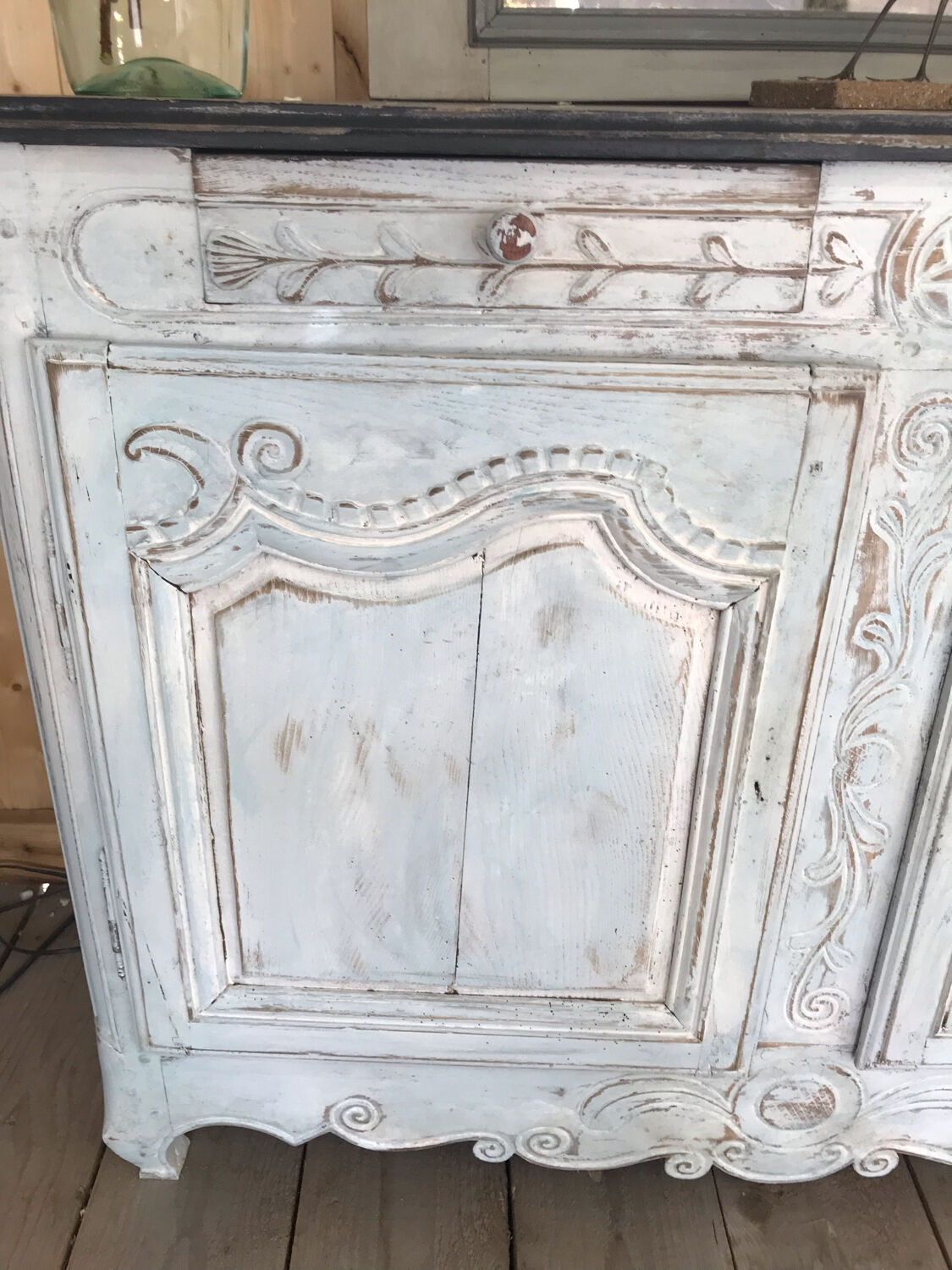 Patinated carved sideboard