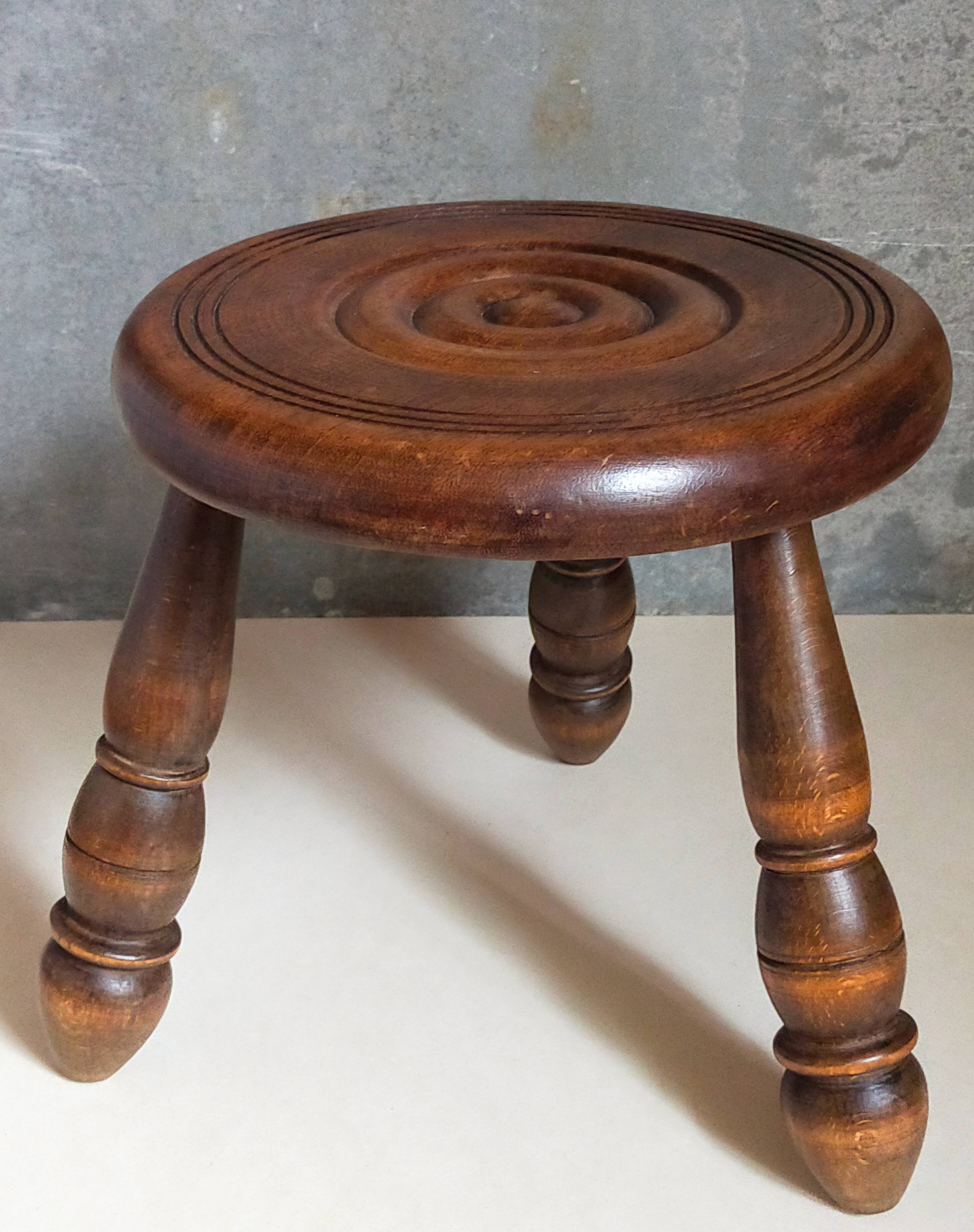 Low tripod stool in vintage turned solid wood