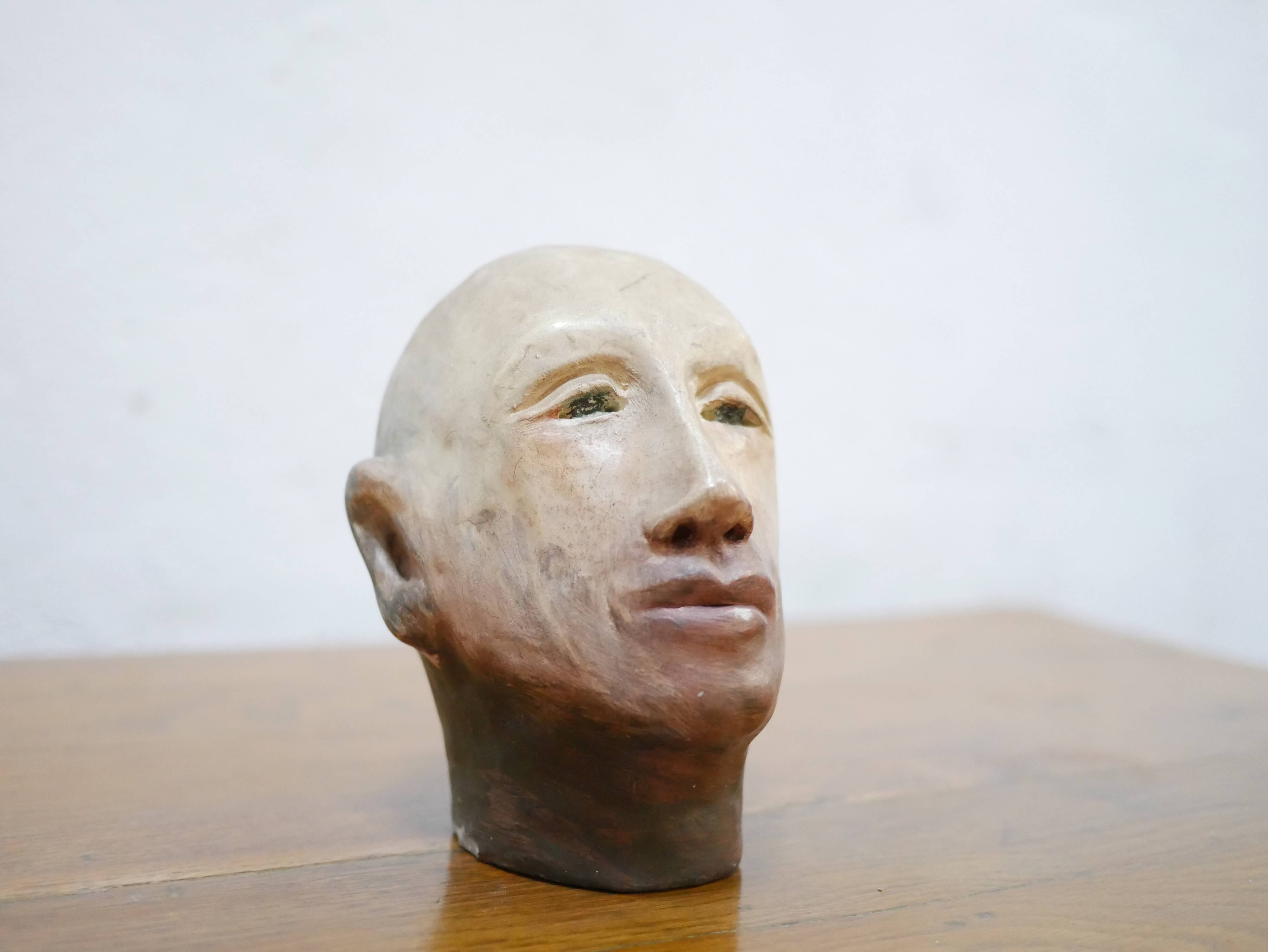 Terracotta head sculpture