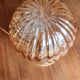 Globe table lamp in amber chiseled glass