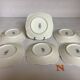 Six small Raynaud Limoges flower plates