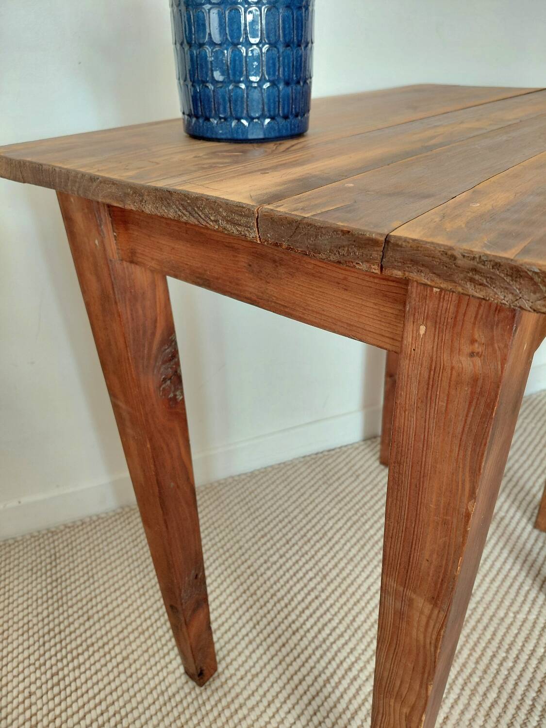 Small antique solid wood table in chic country style with a drawer.