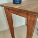 Small antique solid wood table in chic country style with a drawer.