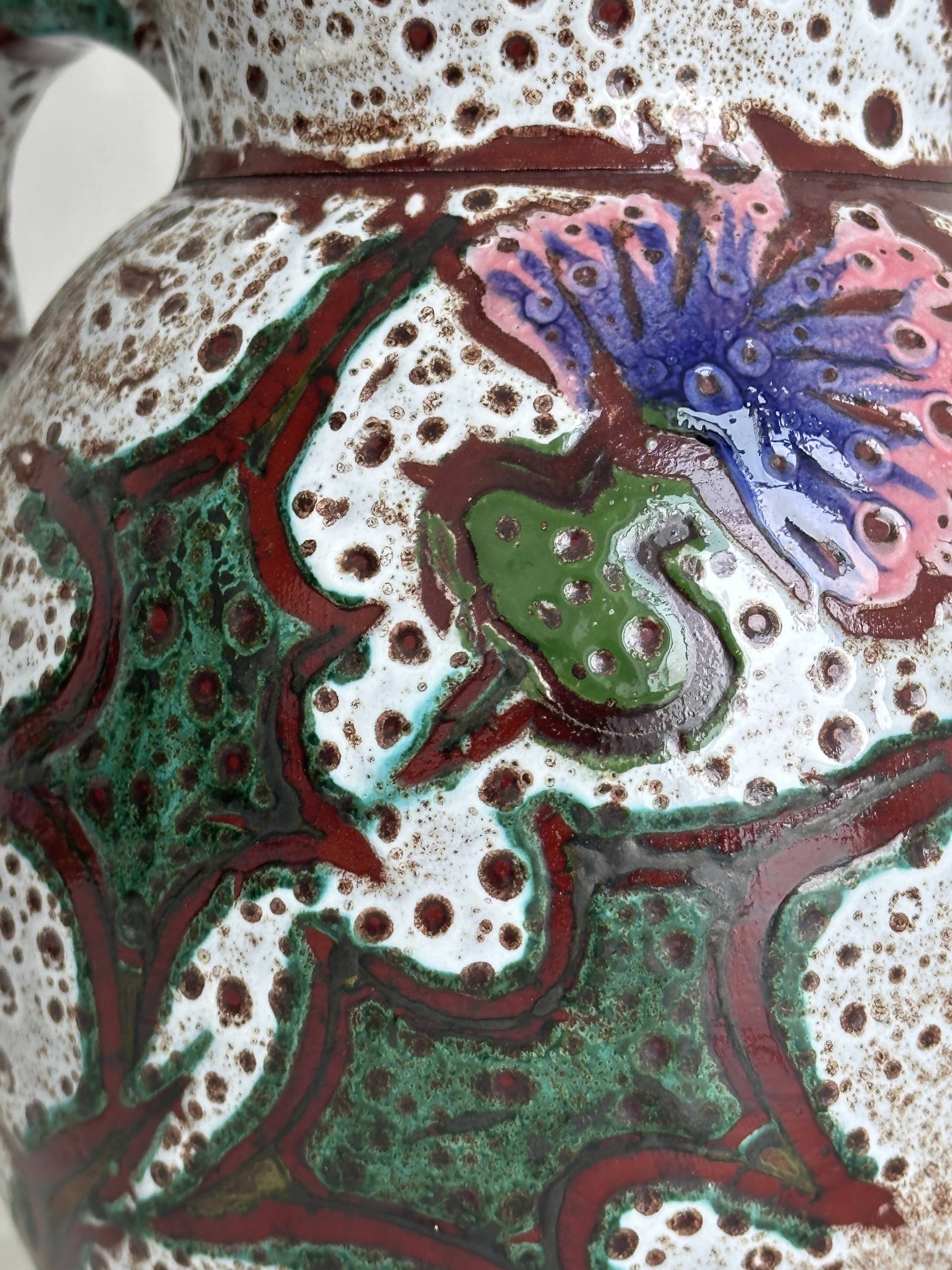 Antique decorative ceramic pitcher