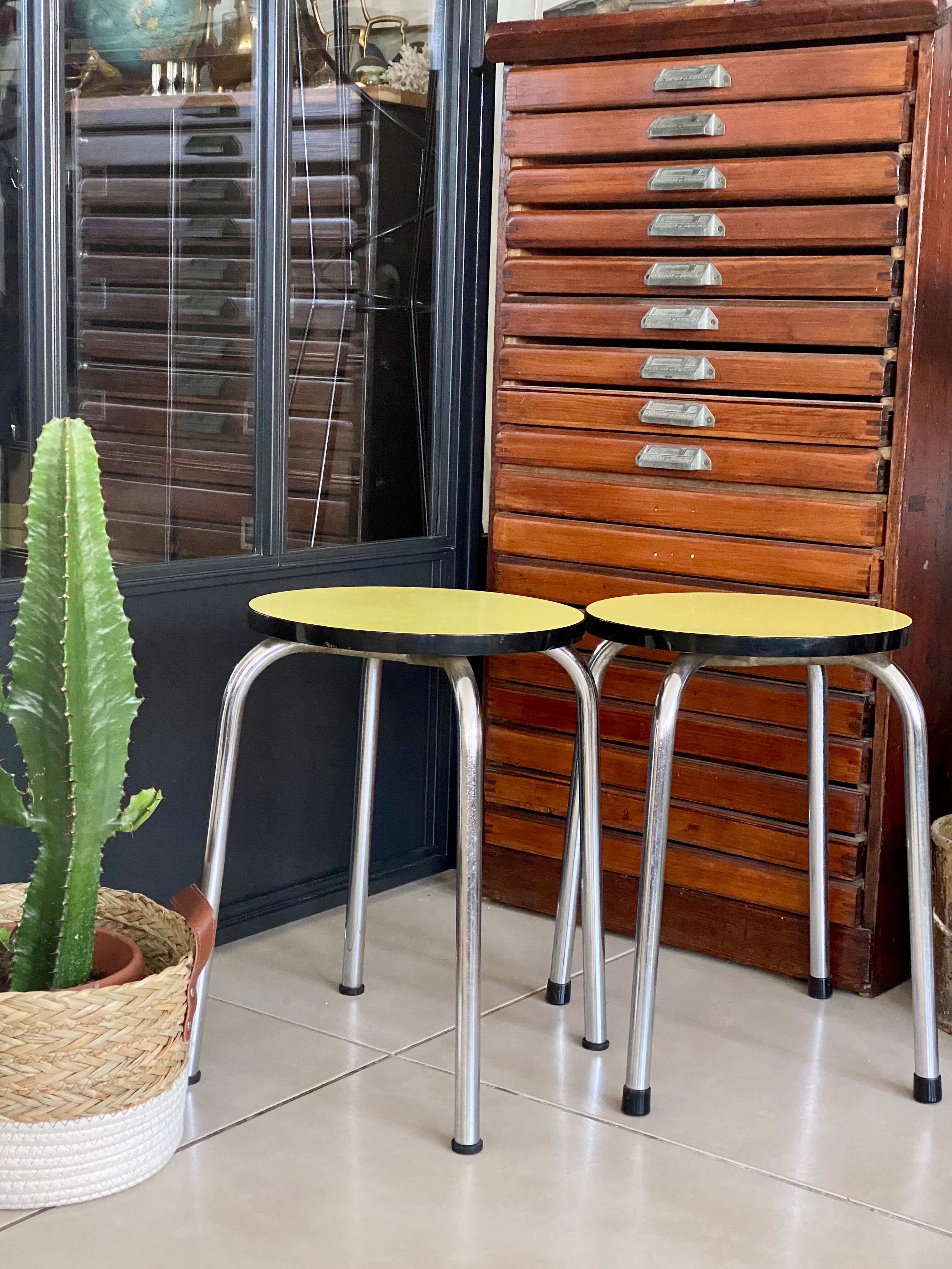 Pair of yellow Formica stools