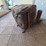 Chesterfield armchair with folding footrest