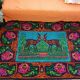Vintage Romanian rug with deers, nature scenery on a floral background