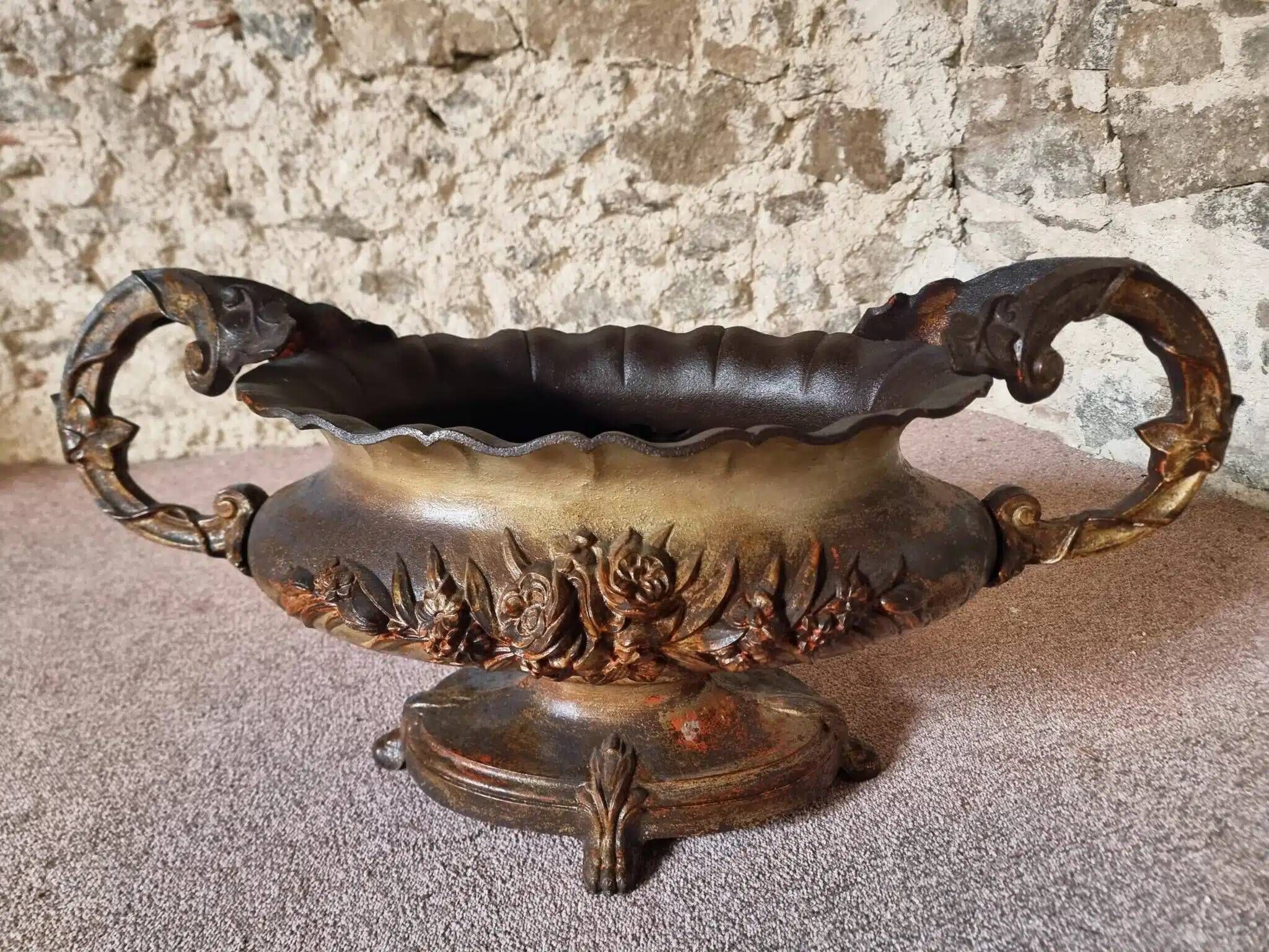 Large antique cast iron planter on a stand, brown-gold patina, France, circa 1900.
