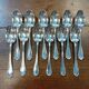 Set of 12 silver-plated metal soup spoons
