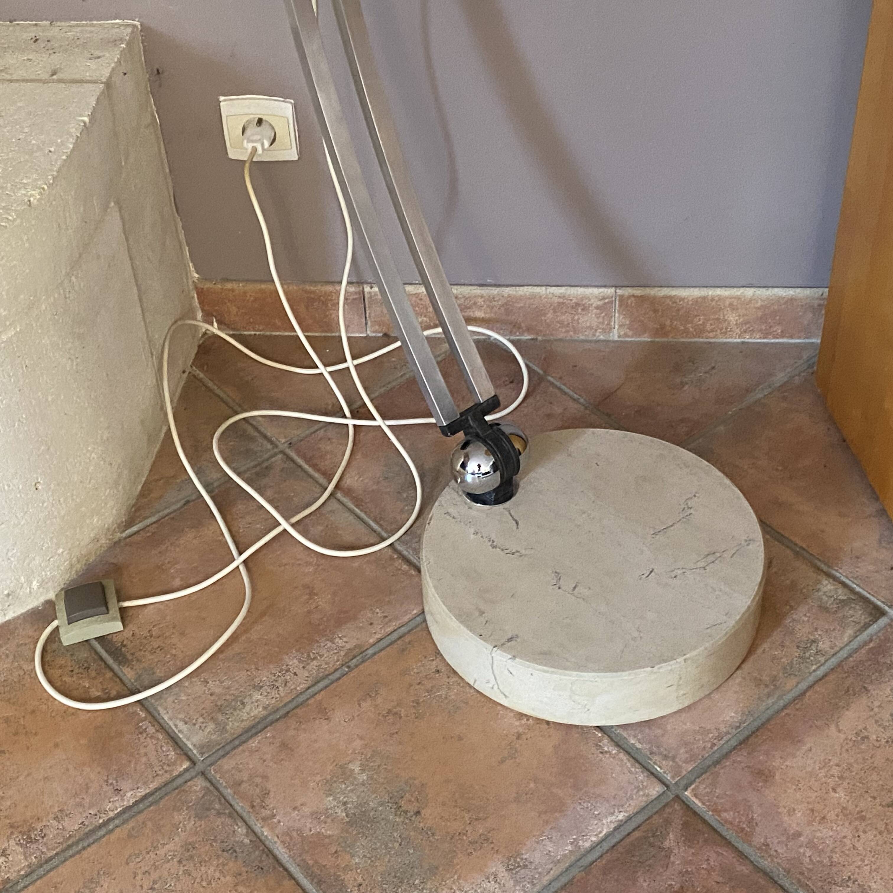 Guzzini arc floor lamp. 1970. Italy. Marble base.