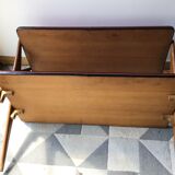 Double-footed red Formica wood spindles console