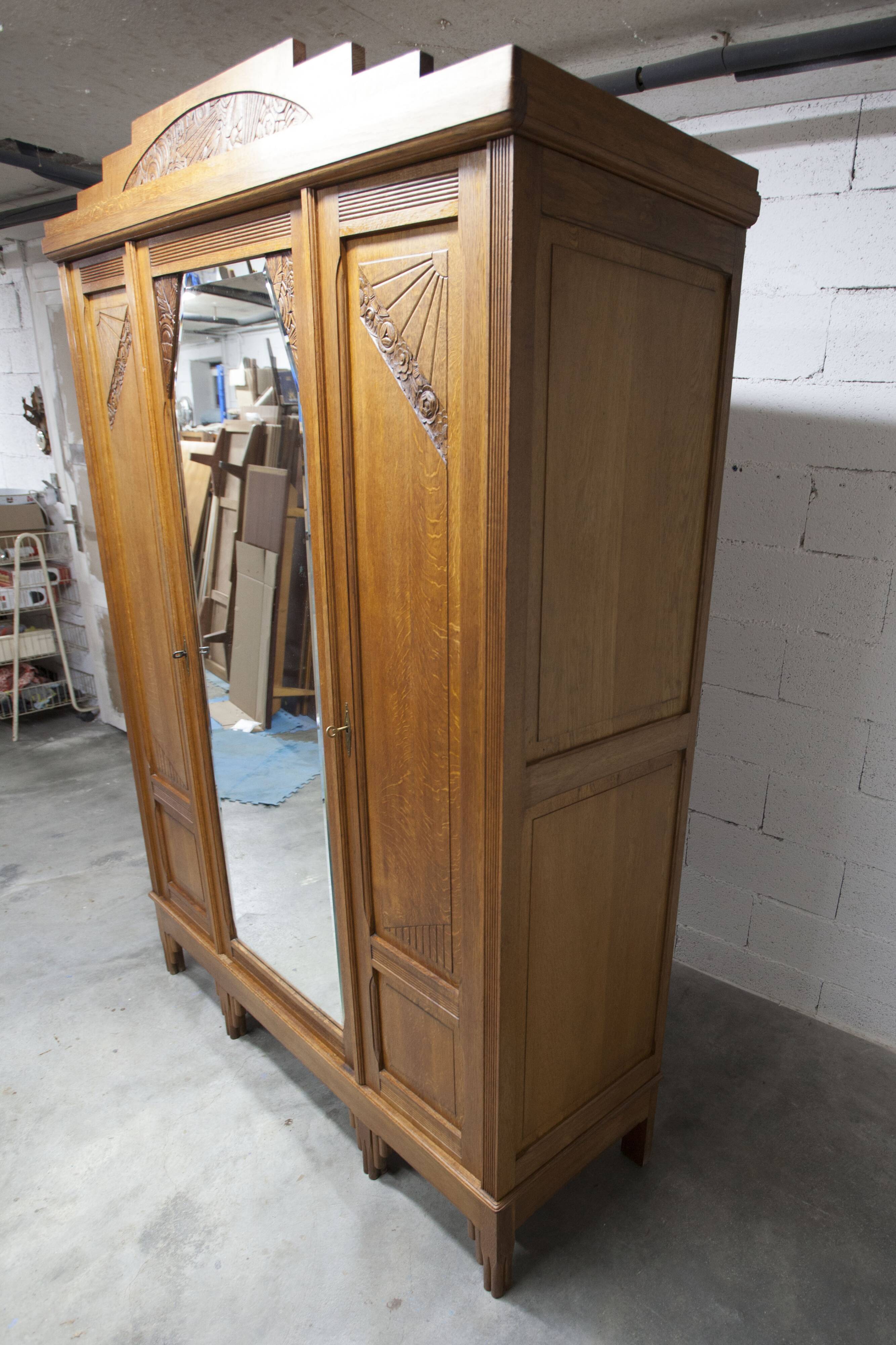Art Deco carved oak wardrobe - Flemish workshop circa 1930