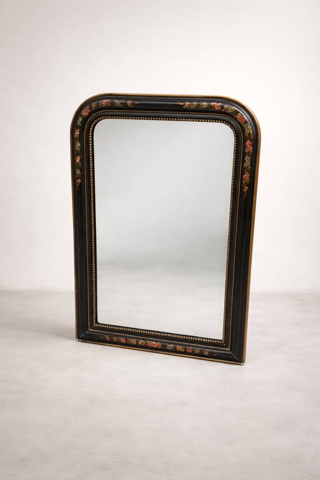 Antique Napoleon III mirror, black frame with hand-painted floral decoration – 19th century