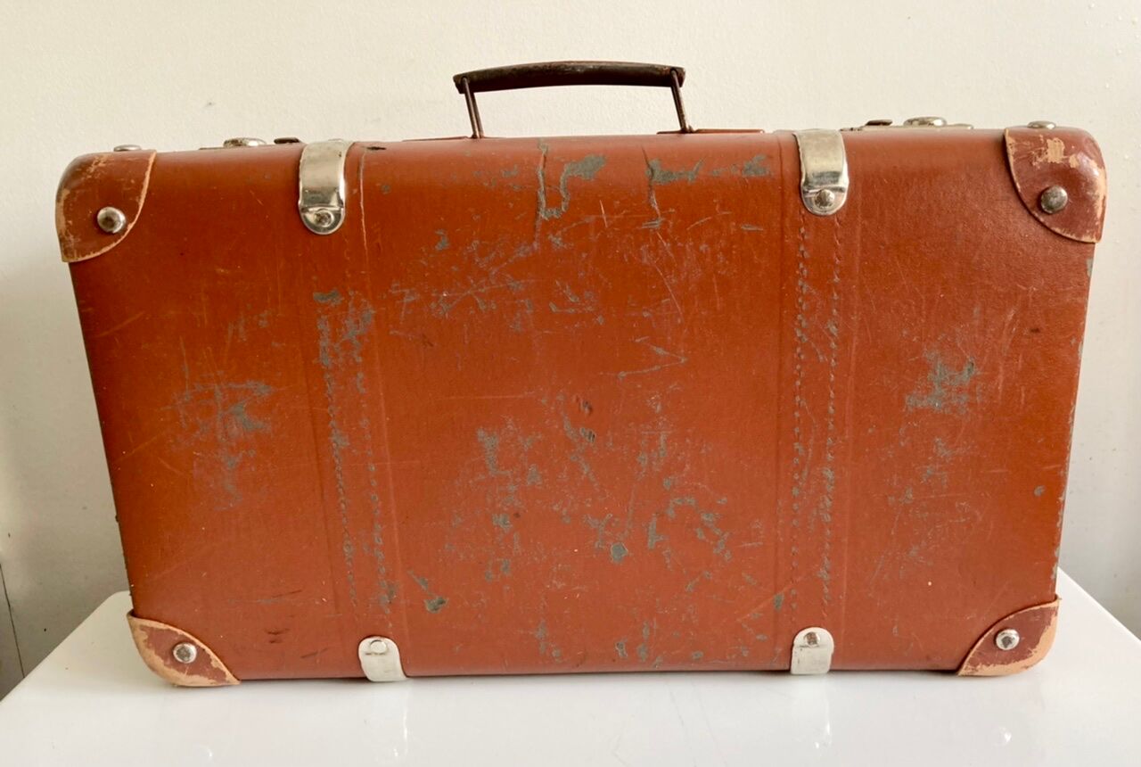 Small old brown suitcase
