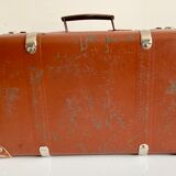 Small old brown suitcase