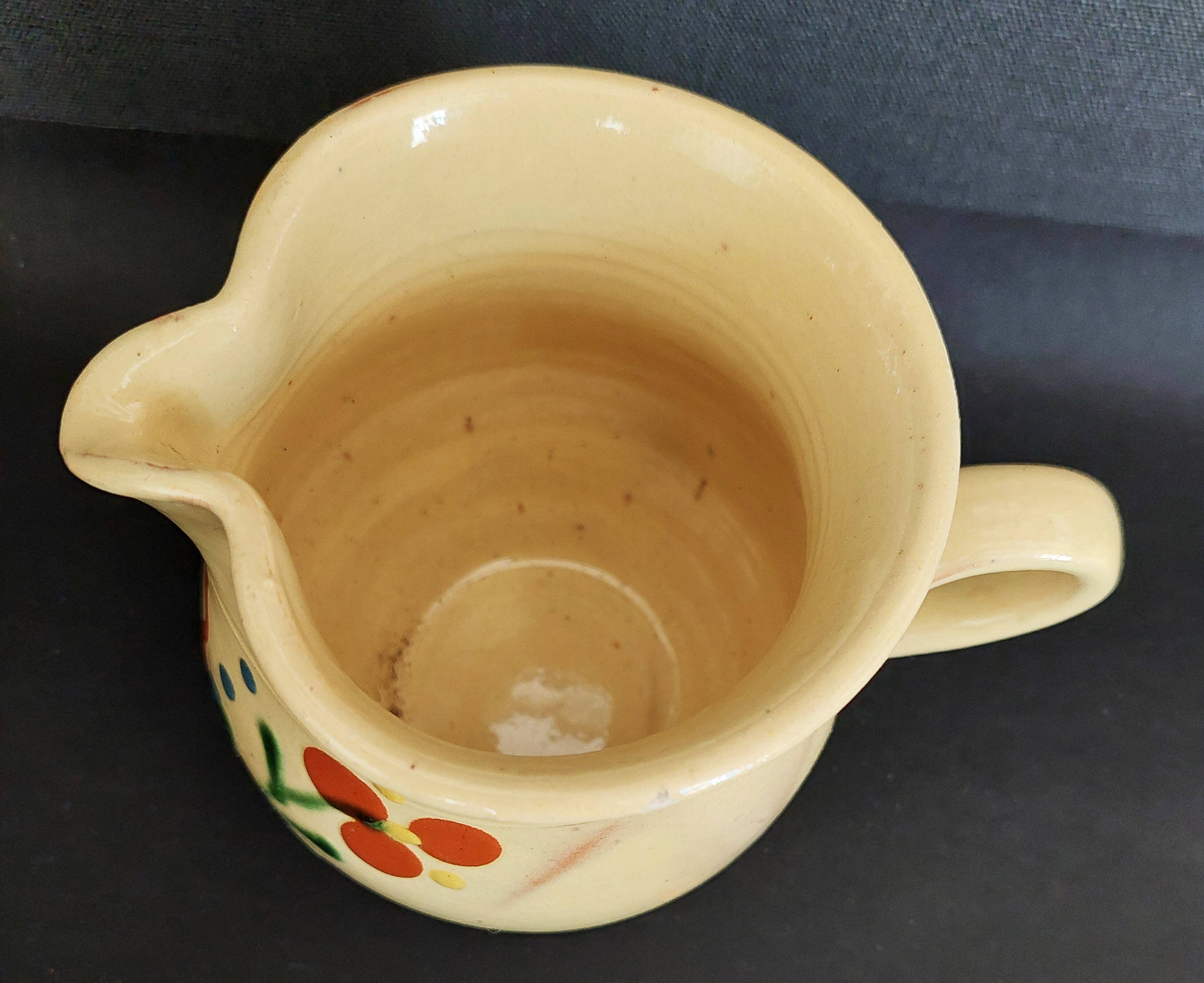 20th century Alsace glazed terracotta pitcher