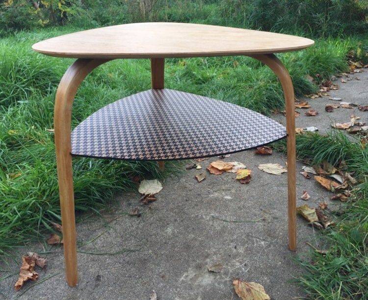 Bow wood coffee table by designer Hugues Steiner