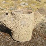 Cement tree trunk planter