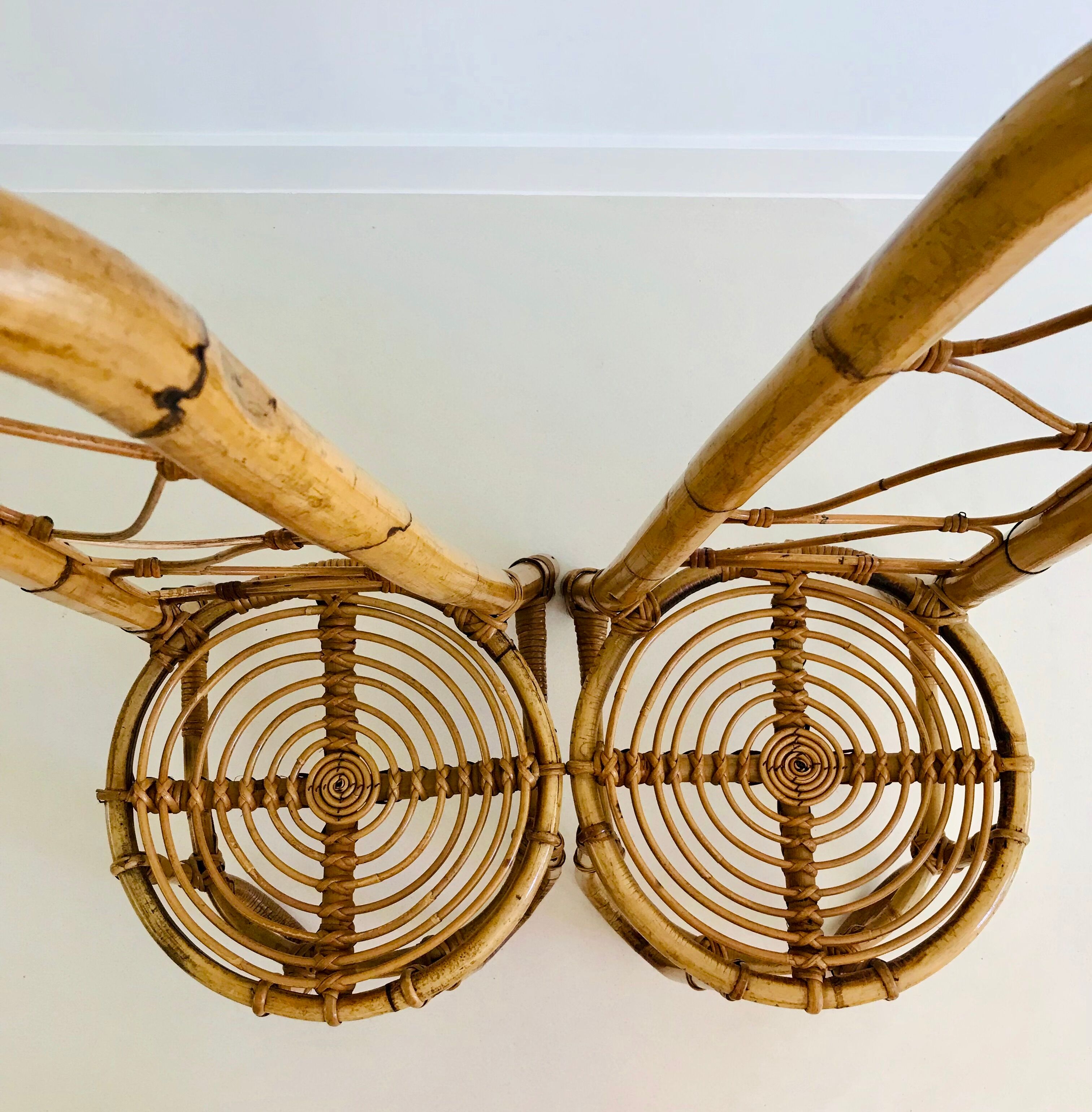 Pair of rattan chairs with high backrests, Italy 60s