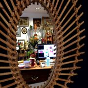 Oval shaped sun mirror in vintage rattan 1960/1970