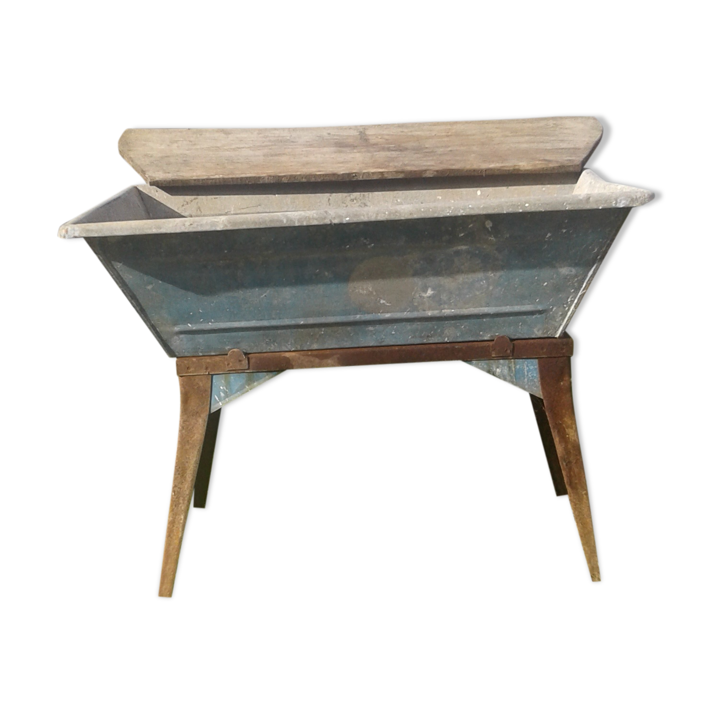 Old galvanized wash on foot