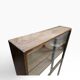 Vintage shallow wooden display shelf with sliding glass doors.
