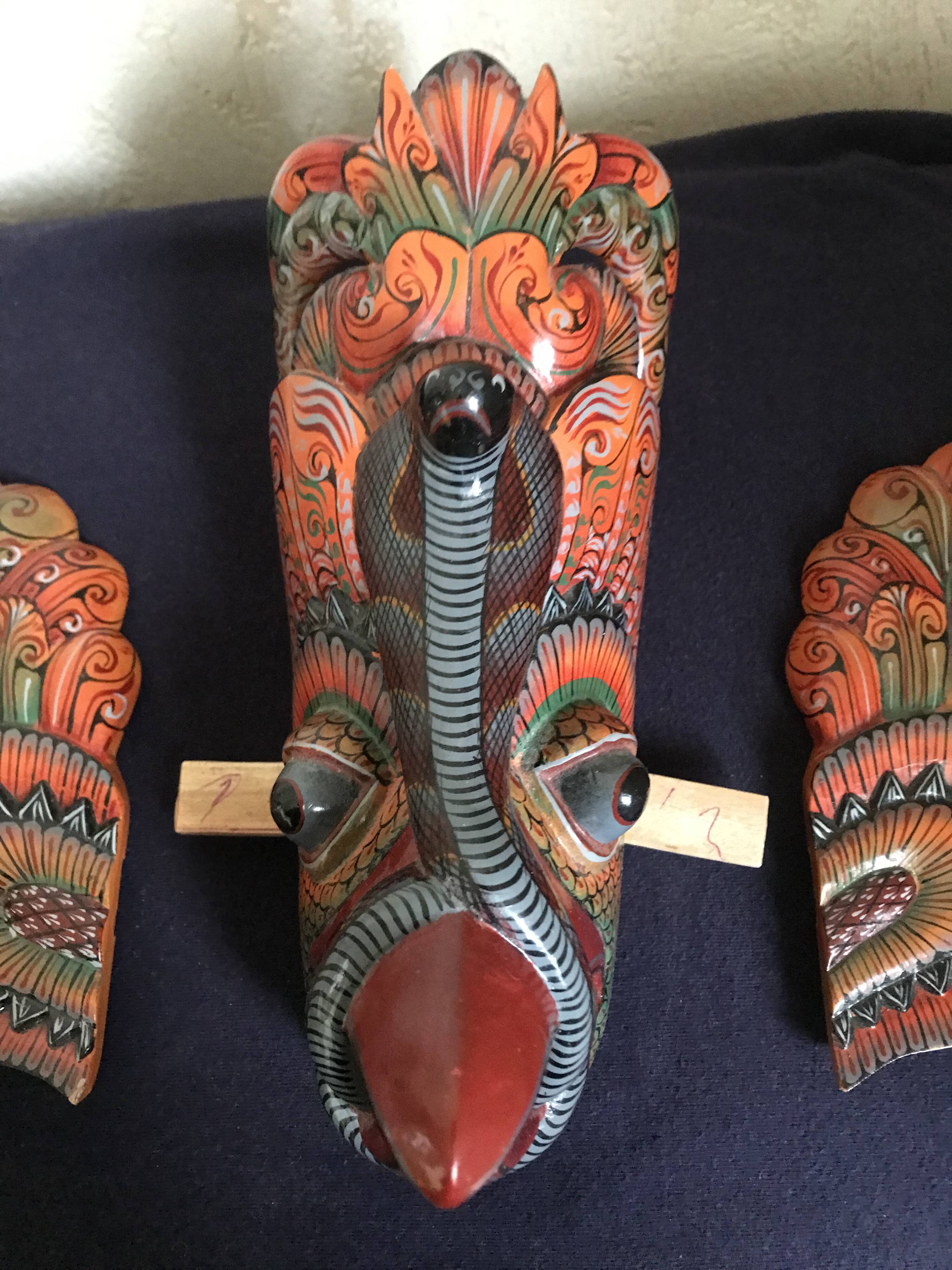 Wooden triptych mask