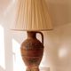 Large ceramic table lamp from West Germany with a pleated shade.