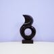 statue vintage en granit noir de Leonardo Nierman