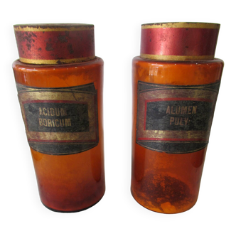 Paire de bocaux de pharmacie en verre ambré, XIXème.