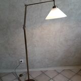 Articulated brass floor lamp