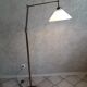 Articulated brass floor lamp