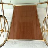 Rolling trolley in gold metal