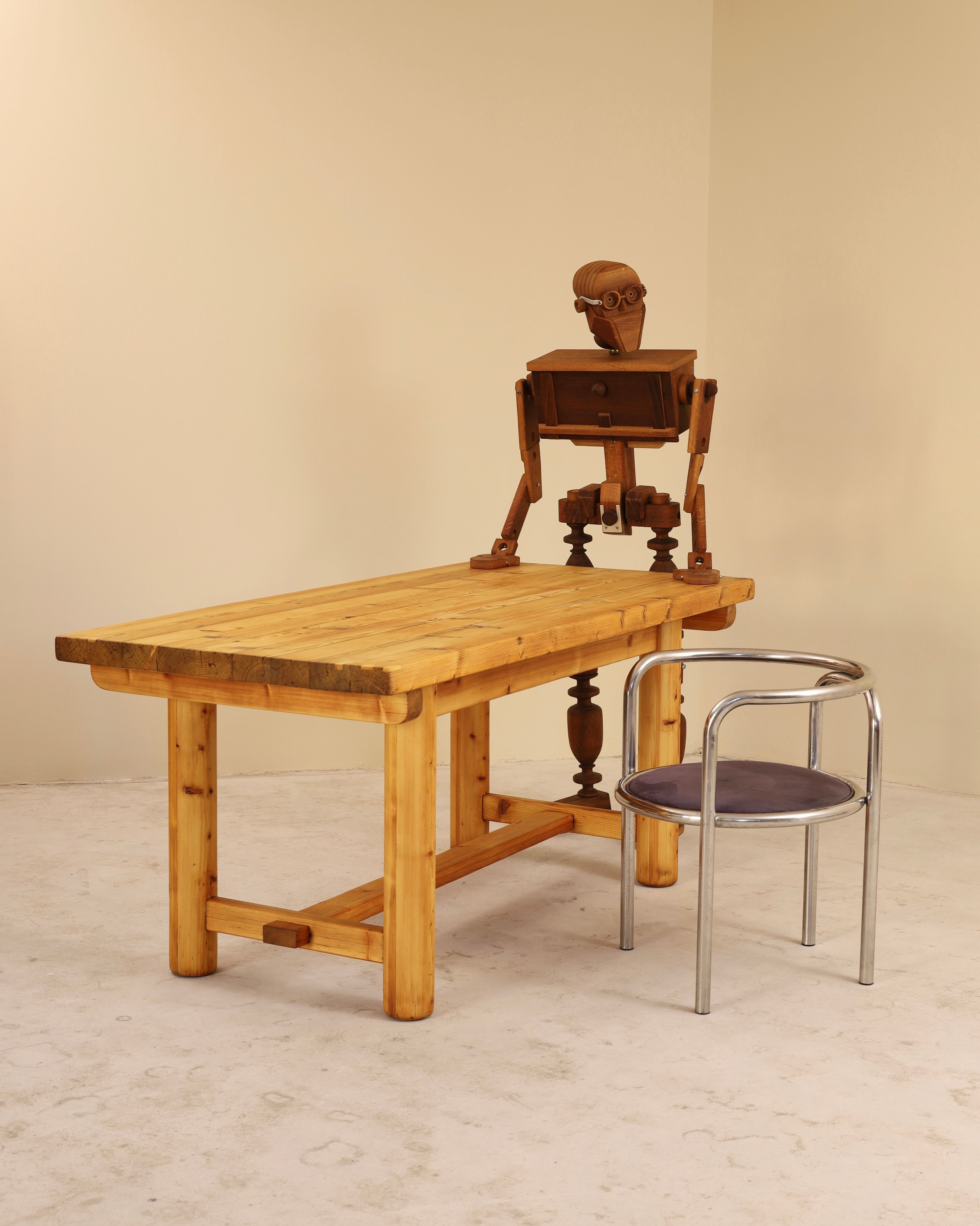 Solid pine table, attributed to Georges Robert, France, 1960s.