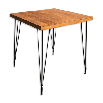 Table with natural wood top, iron legs, 1950s style