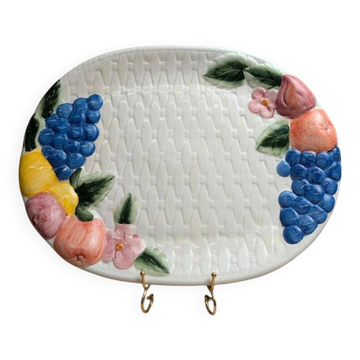 Vintage oval serving dish in majolica – Relief fruit decoration and woven basket design.