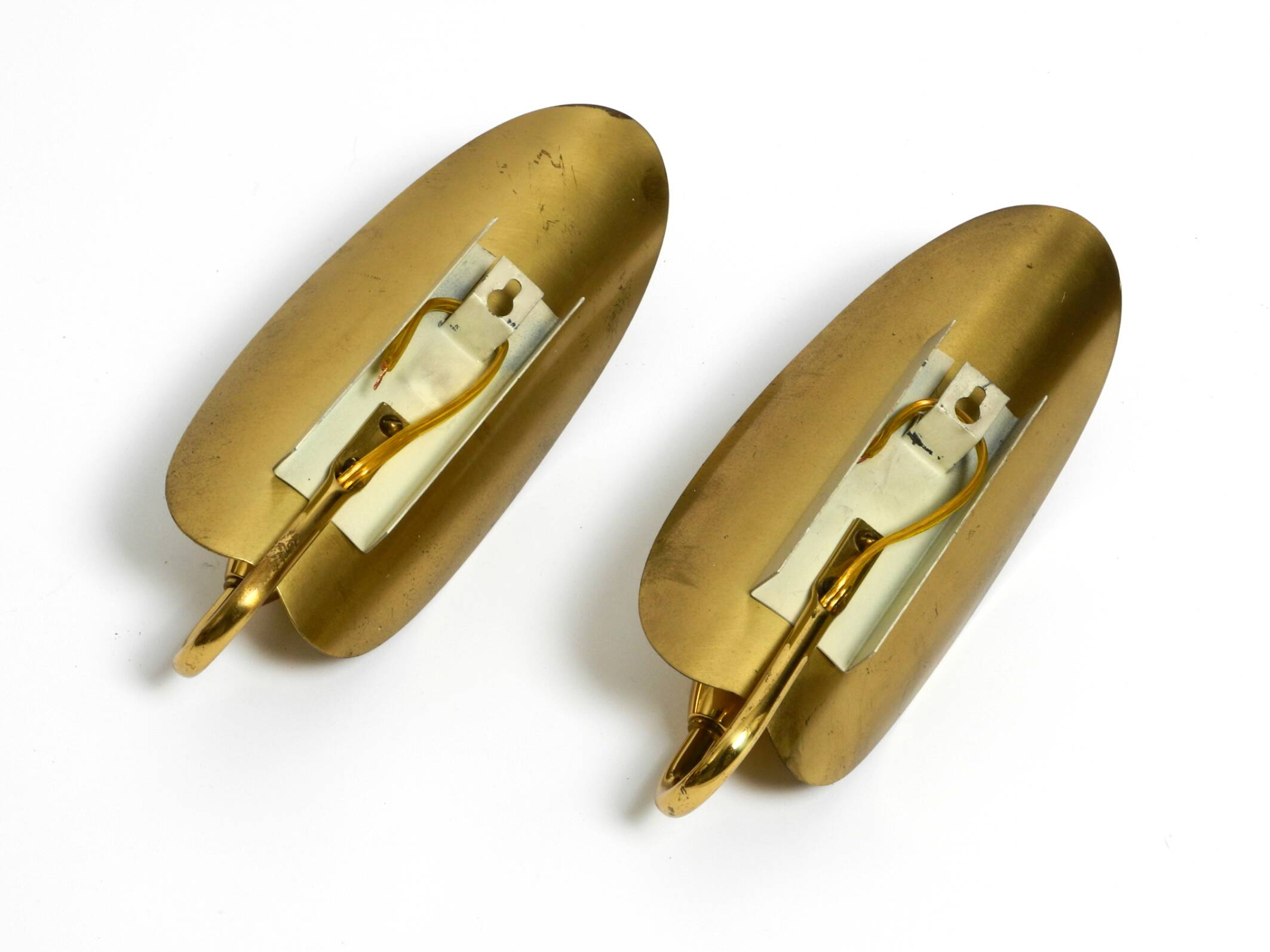 Two magical original Mid Century Modern bag brass wall lamps