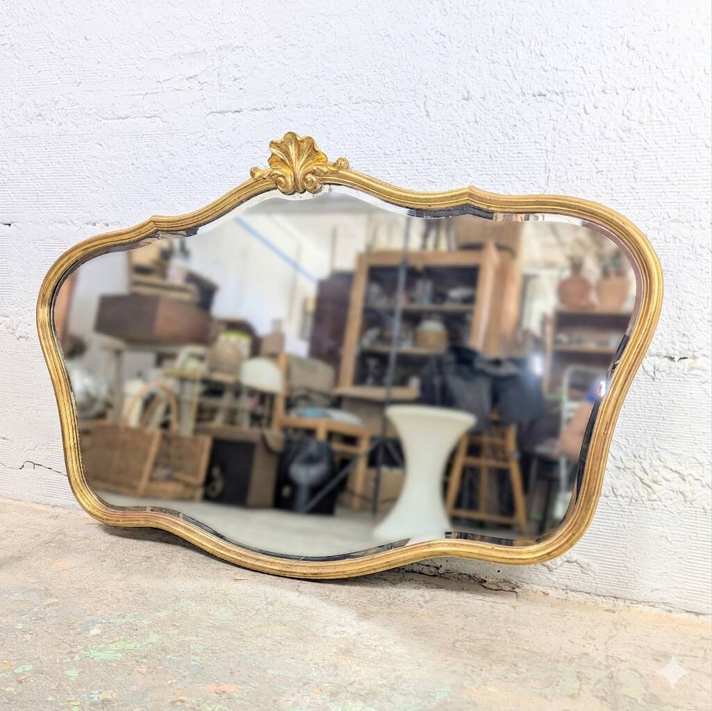 Louis-Philippe gilded mirror with shell pediment
