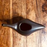 Black enameled ceramic service.