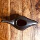 Black enameled ceramic service.