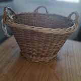 Old wicker basket with 3 handles.