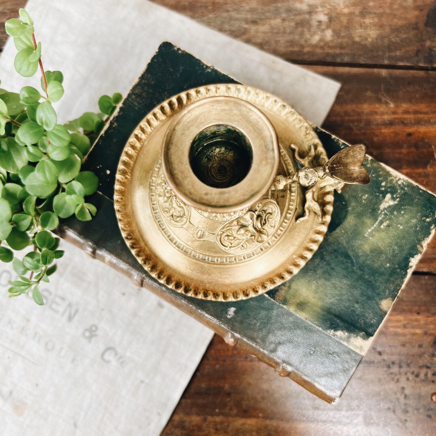 Bronze cellar rat candle holder