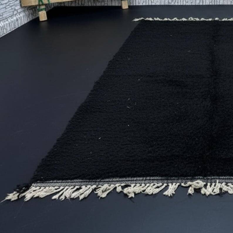 Simple black handmade wool rug 250cm x 150cm
