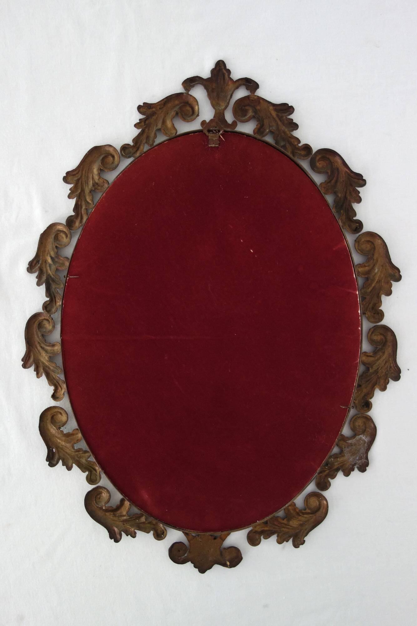 Antique oval art deco brass mirror