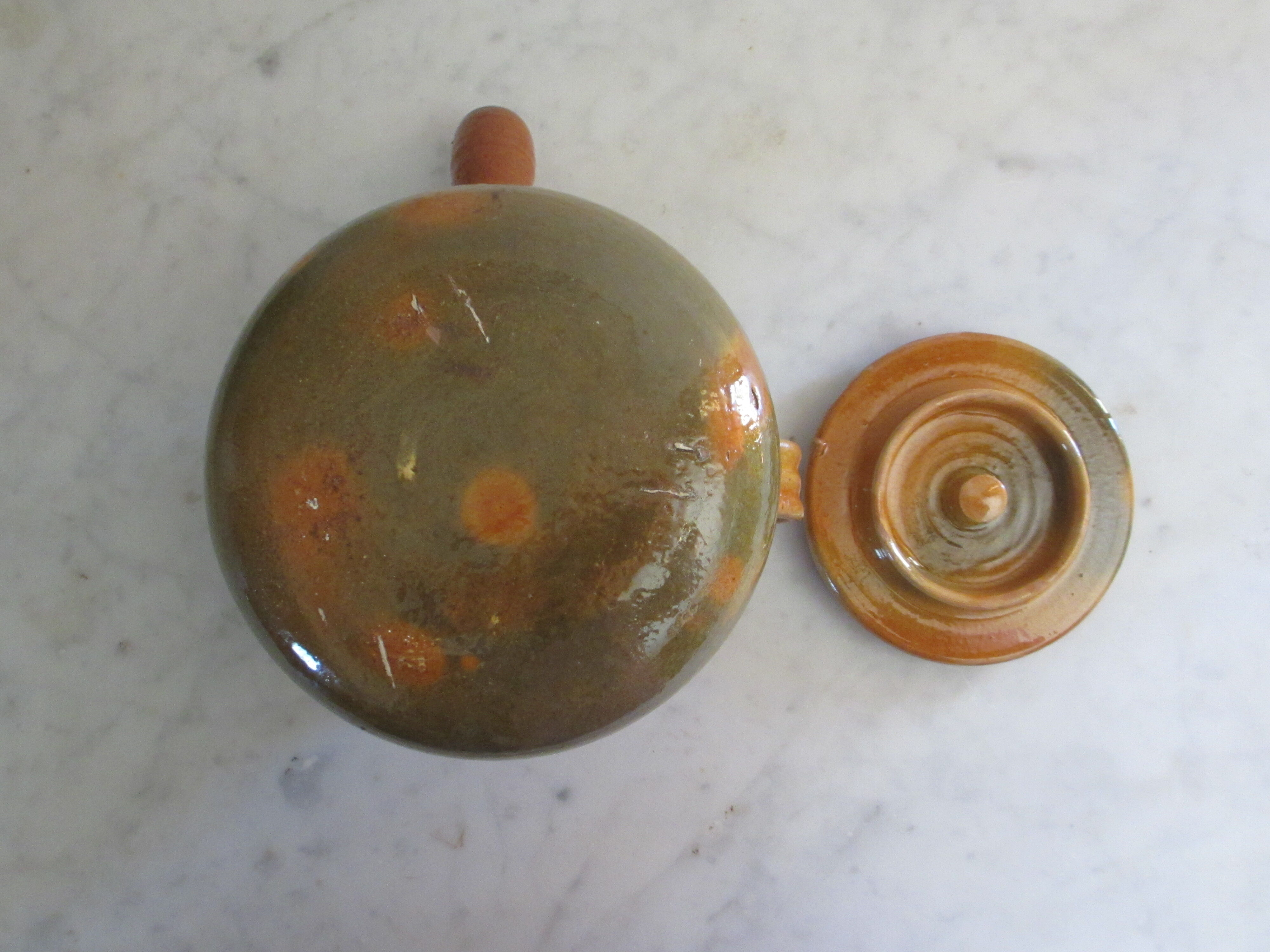 Pignate (in Provence) or glazed terracotta pot.