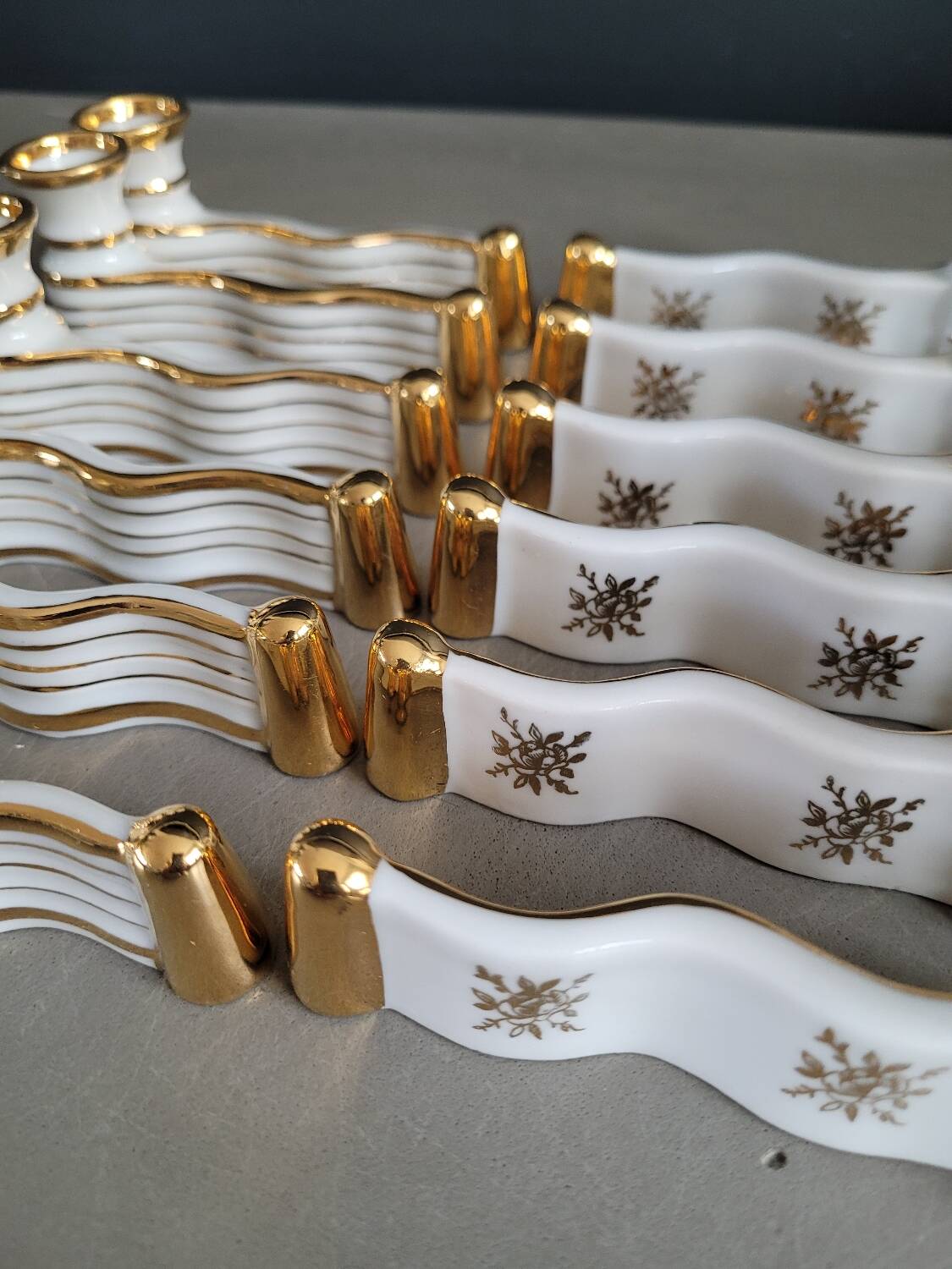 12 Limoges art porcelain knife rests in their case